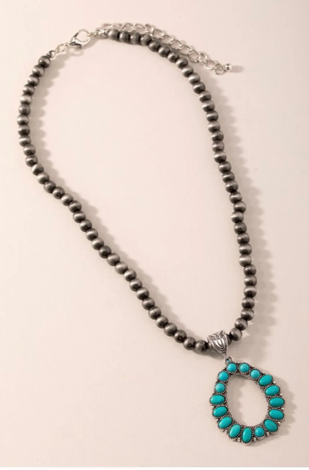 Teardrop Conundrum Pendant Faux Navajo Pearl Necklace