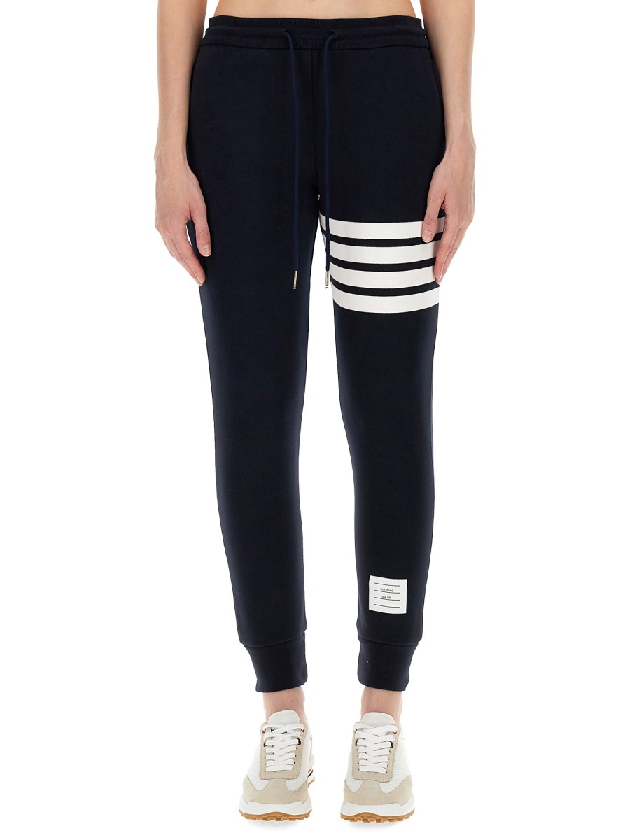 THOM BROWNE    COTTON FLEECE PANTS WITH STRIPED DETAIL